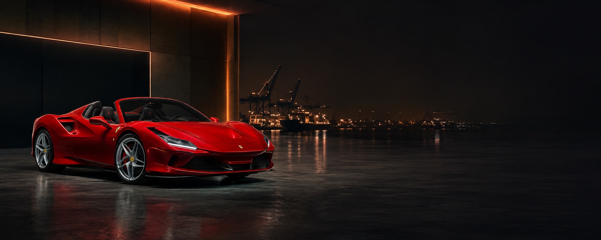 Red Ferrari F8 Spider with its roof open